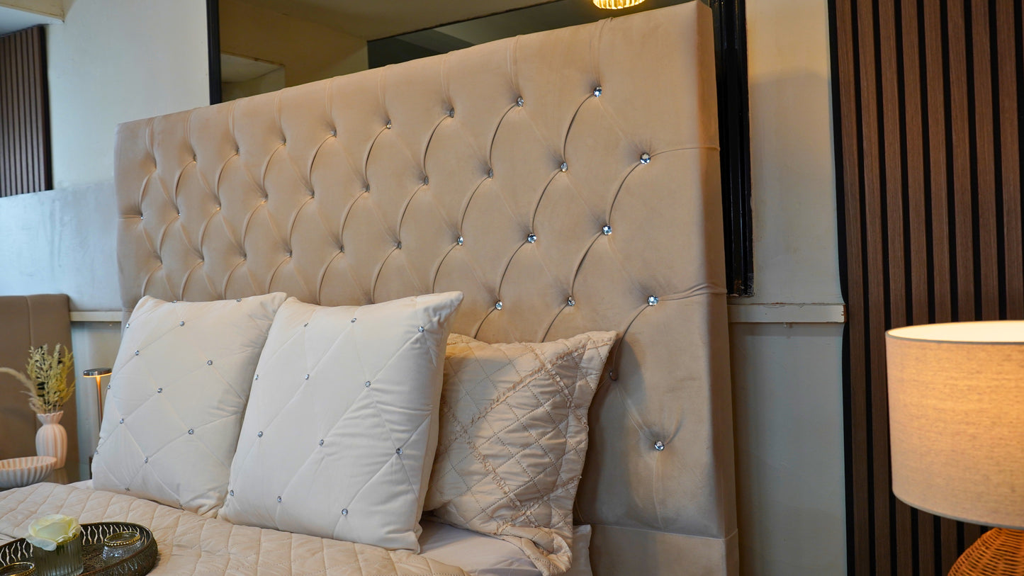 Queen ambassador bed at monarch showroom of headboard
