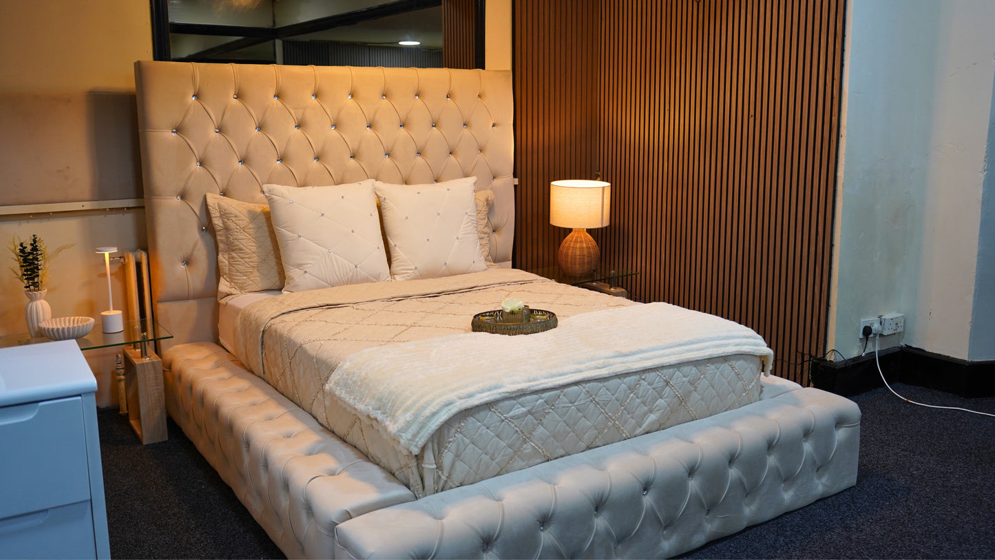 Queen ambassador bed at monarch showroom from side angle of full bed