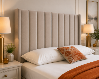 Elegant divan bed with classic Chesterfield headboard